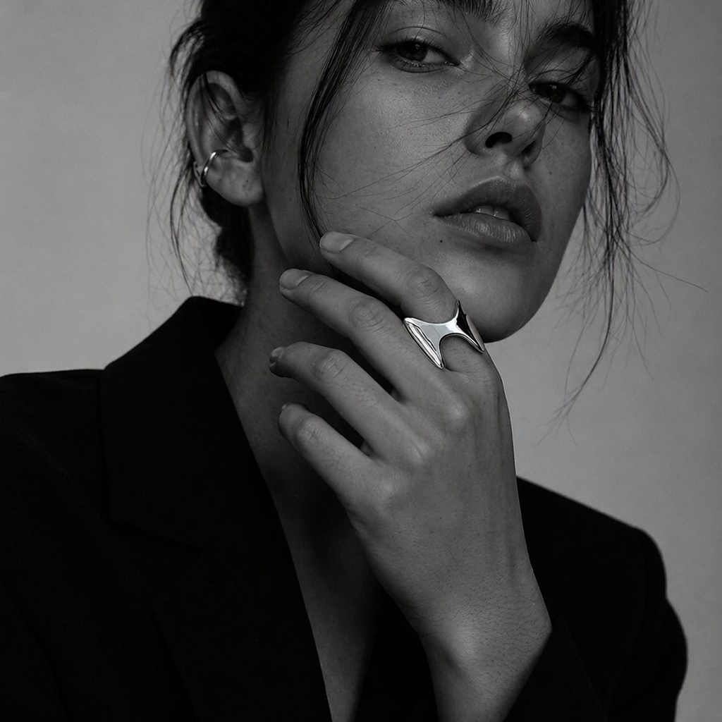 Arc ring by Kaya & Olivia — worn on model, architectural arc form, contemporary