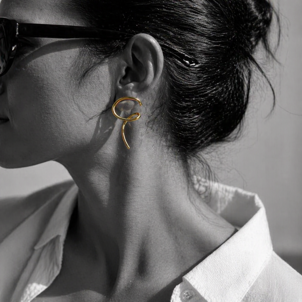 ELLA FLOW earrings by Kaya & Olivia — worn on model, organic flowing sculptural earrings