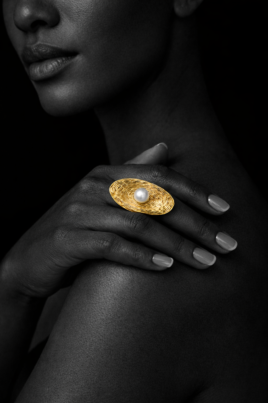 Ozara ring by Kaya & Olivia — sculptural contemporary band, worn on model