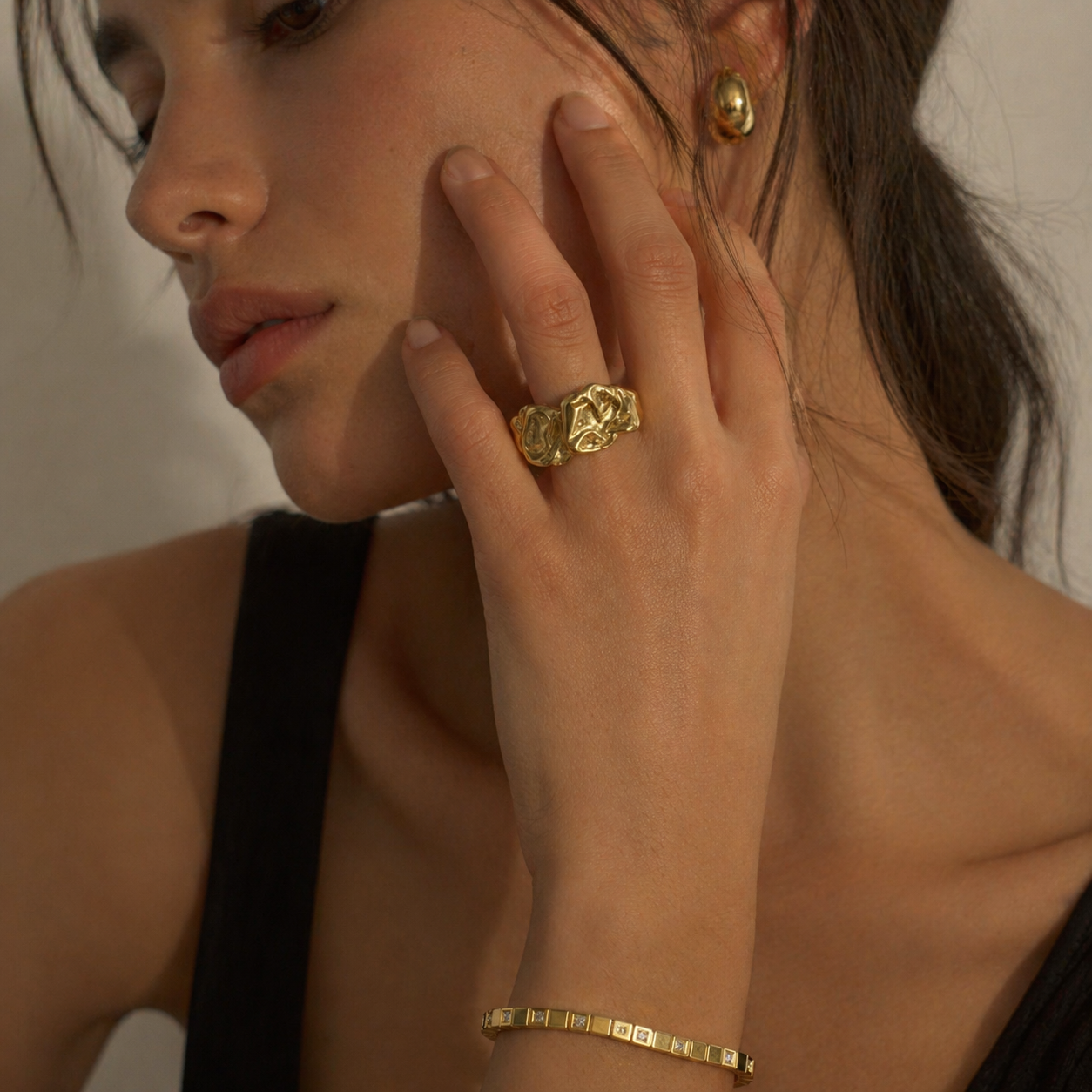 Mora ring by Kaya & Olivia — worn on model, 18k gold-plated sculptural organic ring