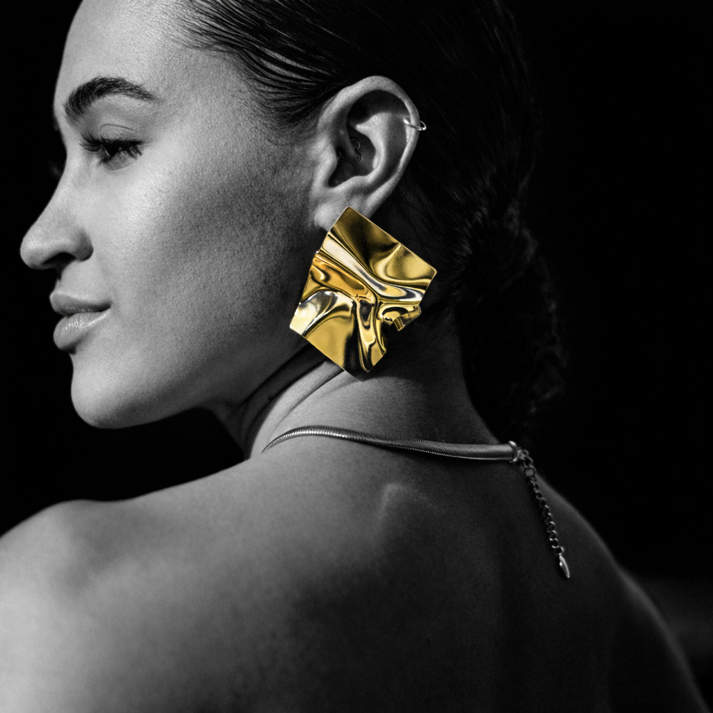 Oceanic earrings by Kaya & Olivia — worn on model, organic wave-inspired design
