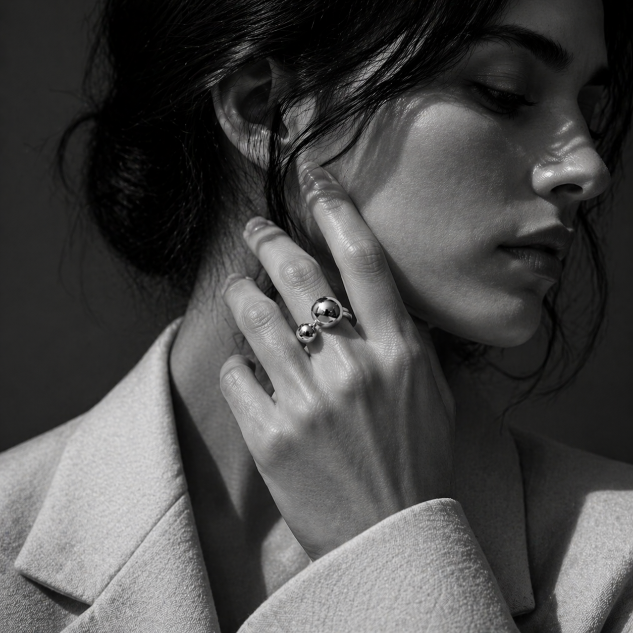 SAGA ring by Kaya & Olivia — silver, organic sculptural silhouette, premium design