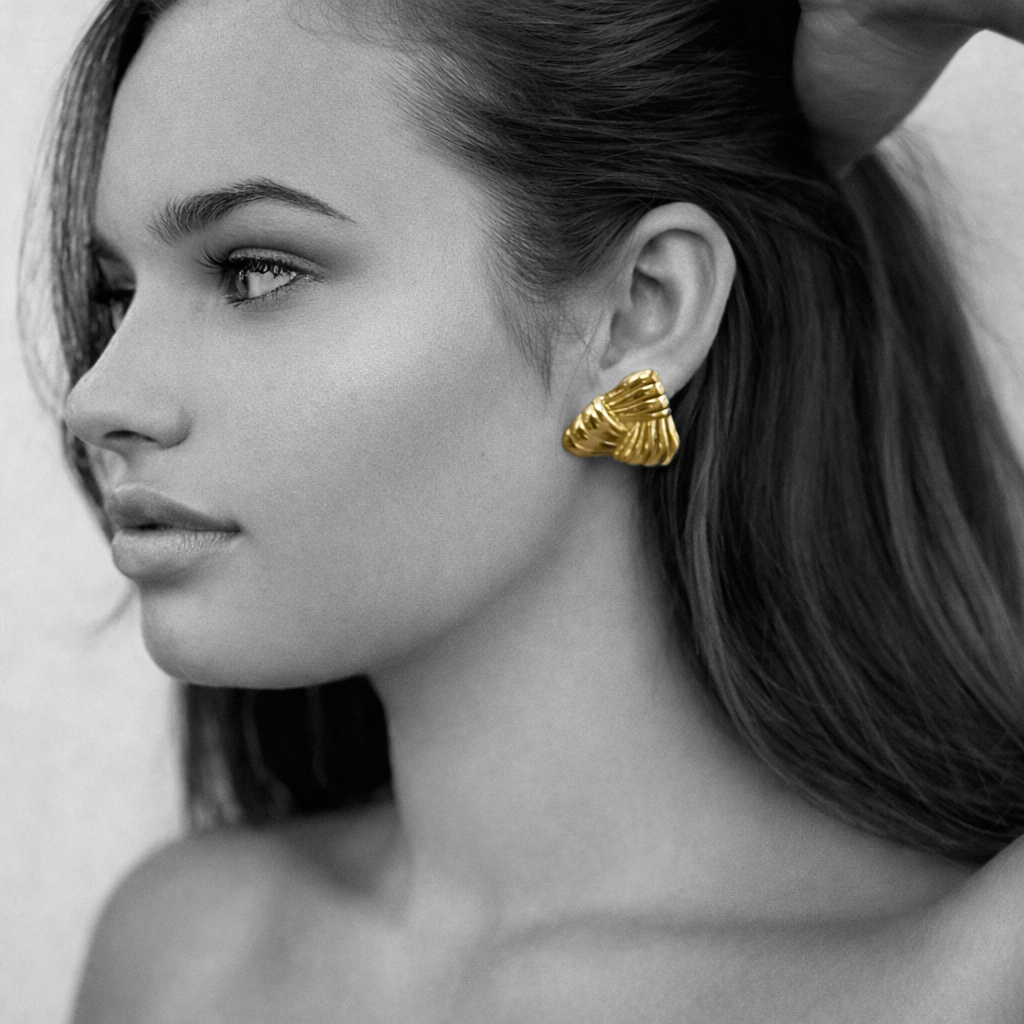 Stella earrings by Kaya & Olivia — worn on model, geometric statement design