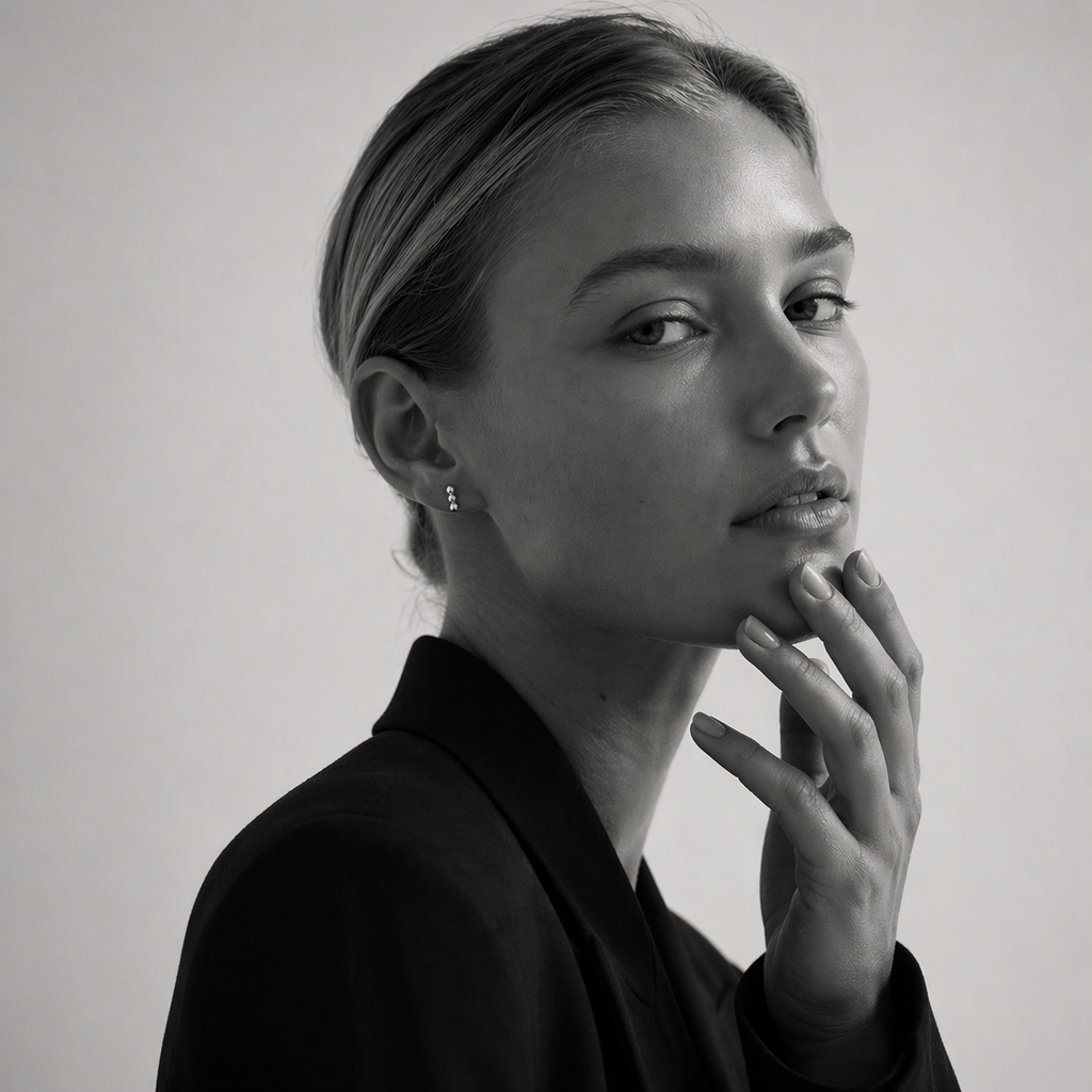 Tria Studs earrings by Kaya & Olivia — silver, worn on model, triple stud design