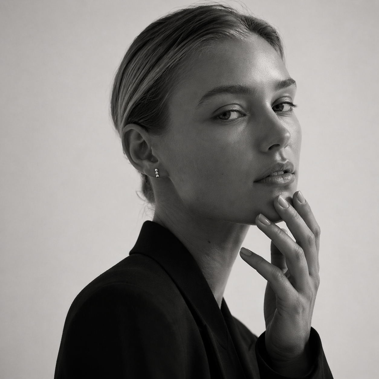 Tria Studs earrings by Kaya & Olivia — silver, worn on model, triple stud design