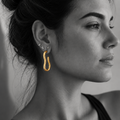 Malou earrings by Kaya & Olivia — worn on model, contemporary geometric design