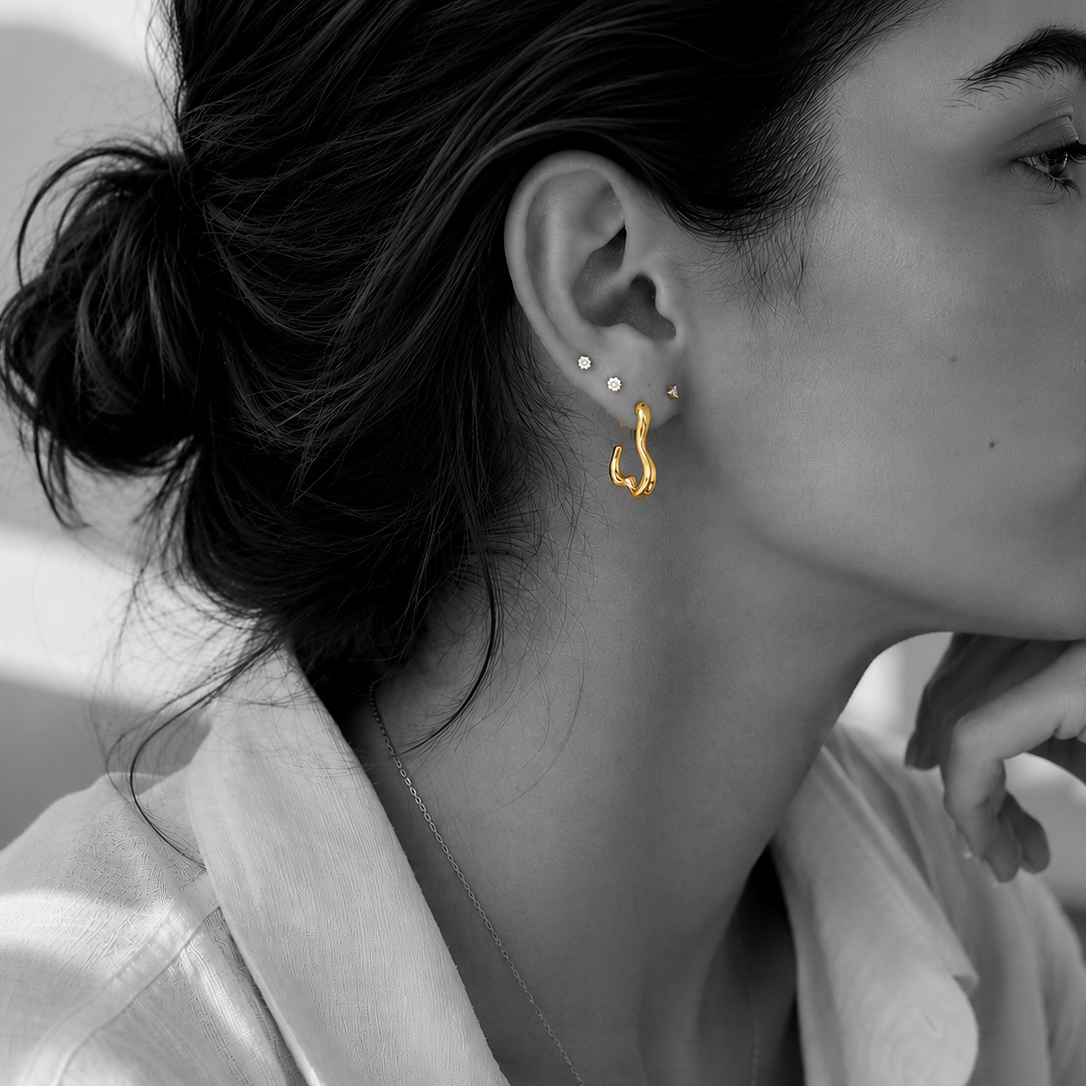 Marais earrings by Kaya & Olivia — black and white lifestyle, sculptural organic design